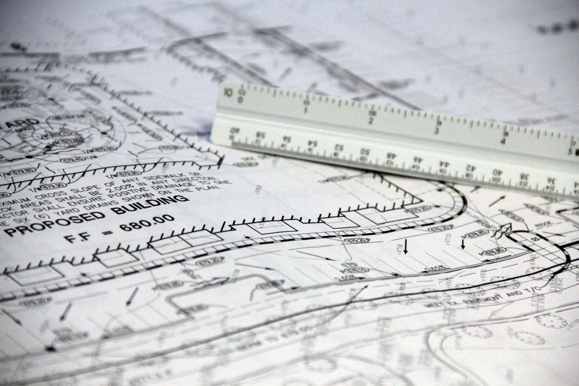 Steel ruler across a technical drawing